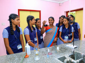 JMJ School students conducting a practical science experiment