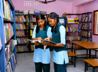 JMJ School students reading books inside the library